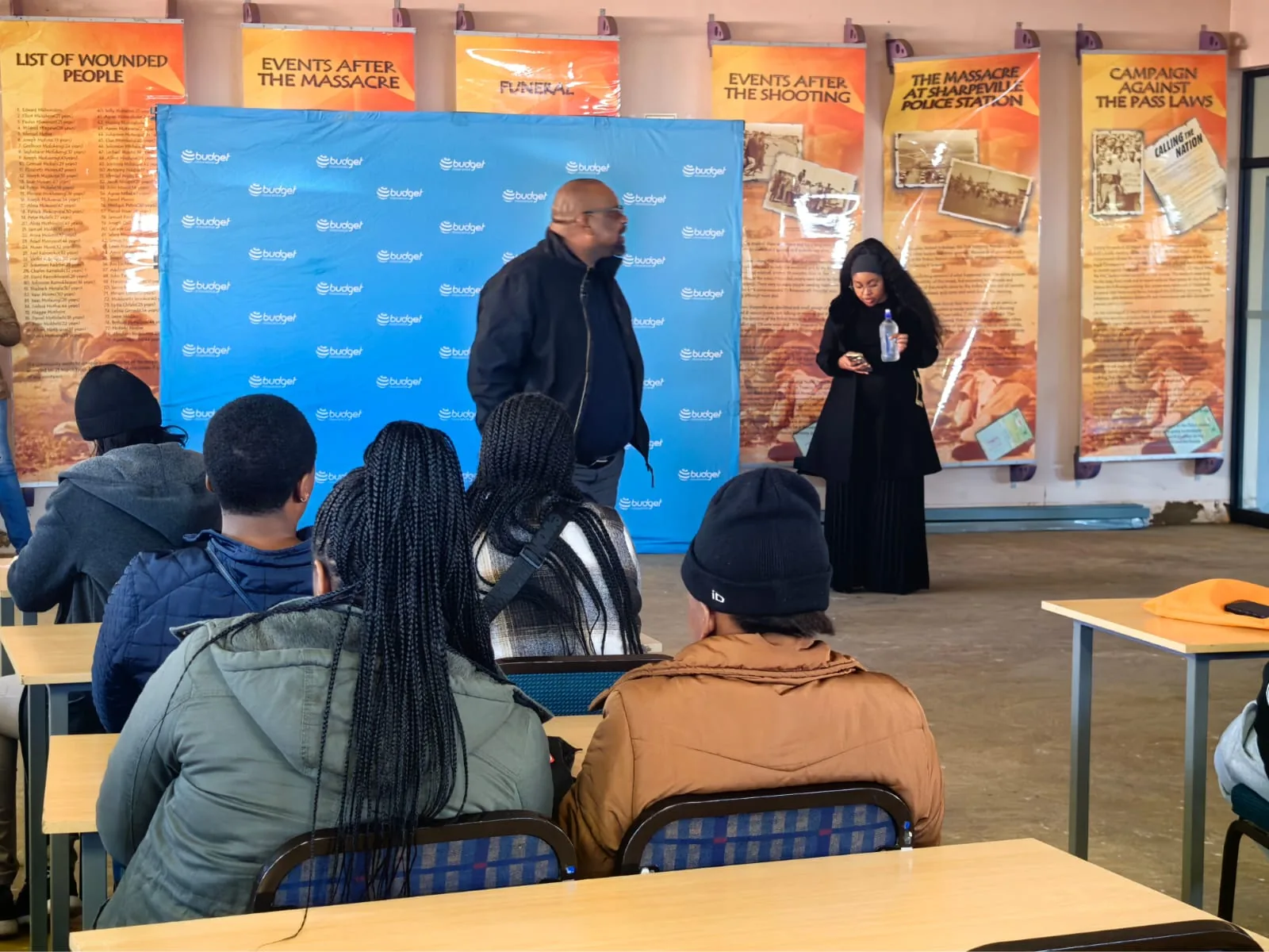 Young people at an SNC session in front of the Sharpeville history exhibition